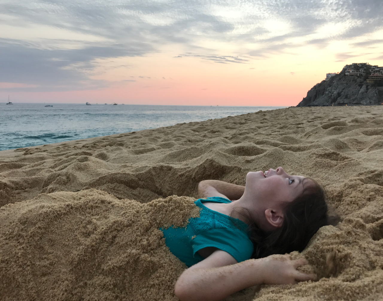 My Daughter Burred In Sand, Underneath the Clouds