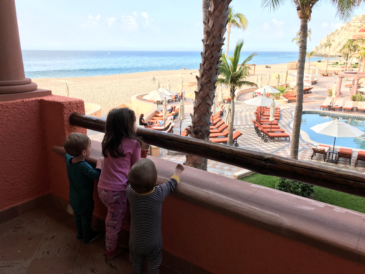 My Three Kids Looking Out from the Balcony of Our Room
