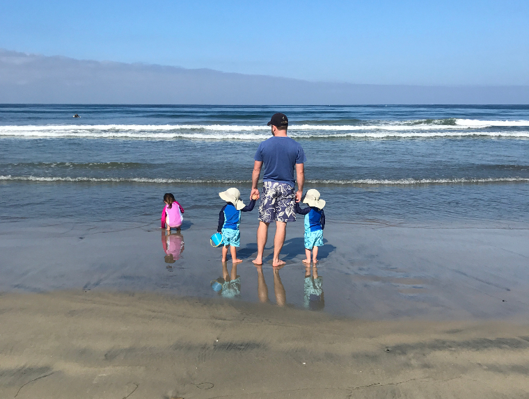 The three kids and I on the beach during our vacation to San Diego