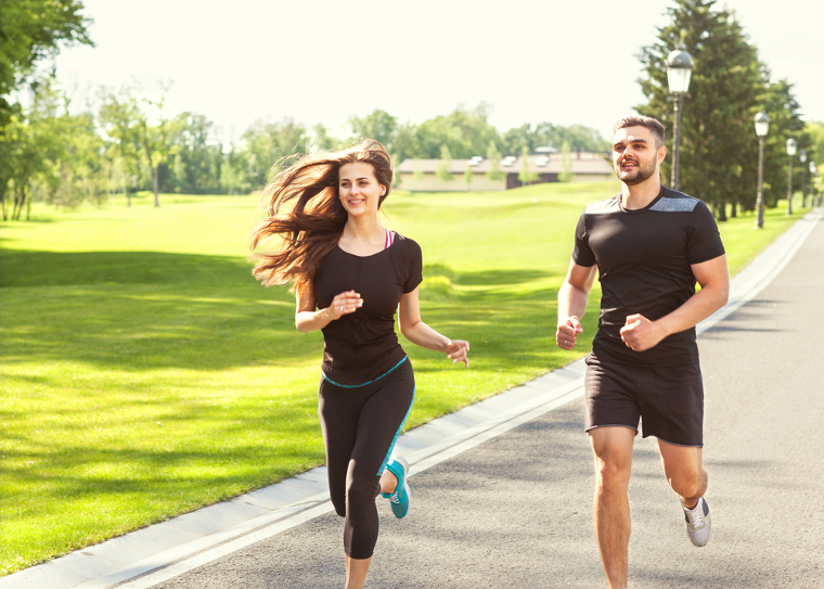 A woman and man doing a sprint workout